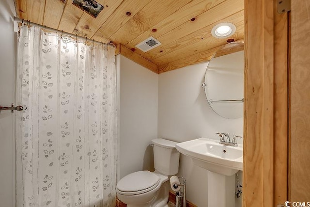 bathroom with walk in shower, vaulted ceiling, wood ceiling, and toilet