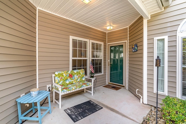 doorway to property featuring a patio