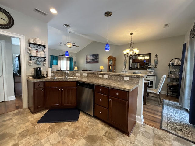 kitchen with dishwasher, a sink, visible vents, and lofted ceiling