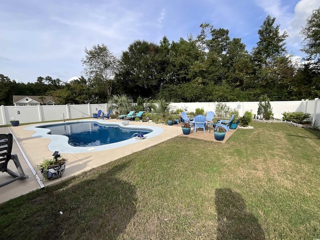 view of pool featuring a lawn, a patio area, a fenced backyard, and a fenced in pool