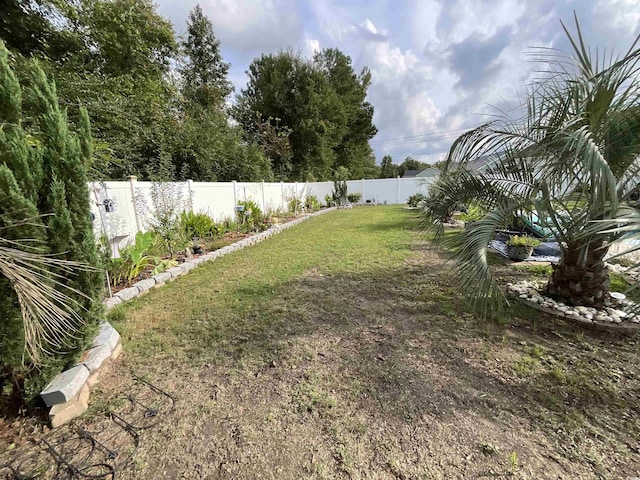 view of yard featuring a fenced backyard