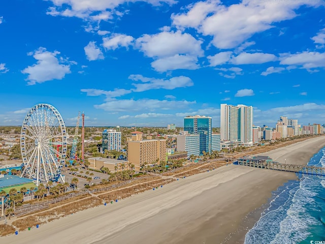 view of city with a water view and a beach view