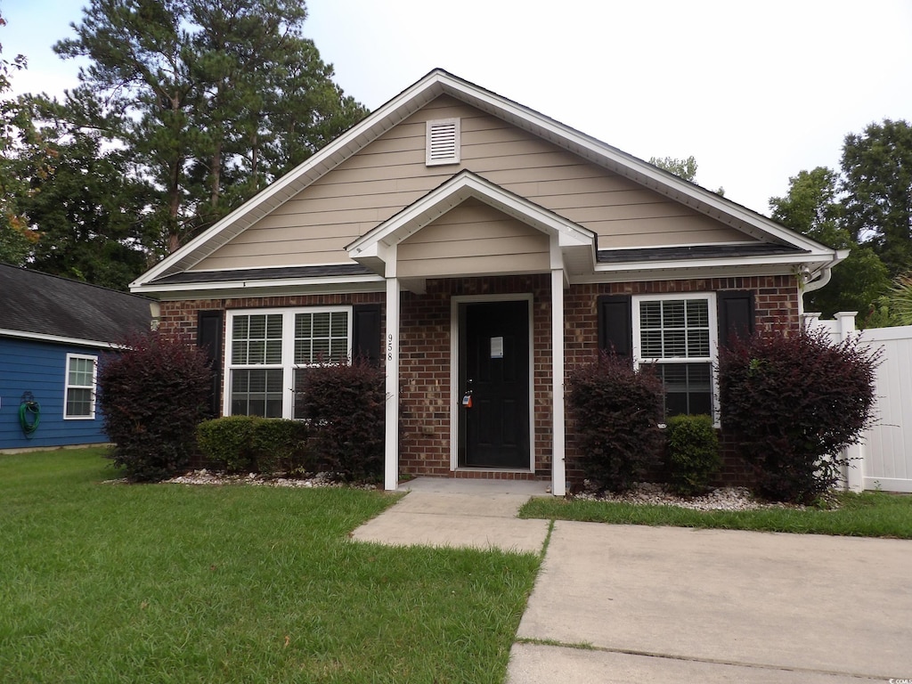 view of front of home with a front yard