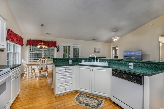 kitchen featuring light hardwood / wood-style floors, sink, ceiling fan with notable chandelier, white cabinetry, and white appliances