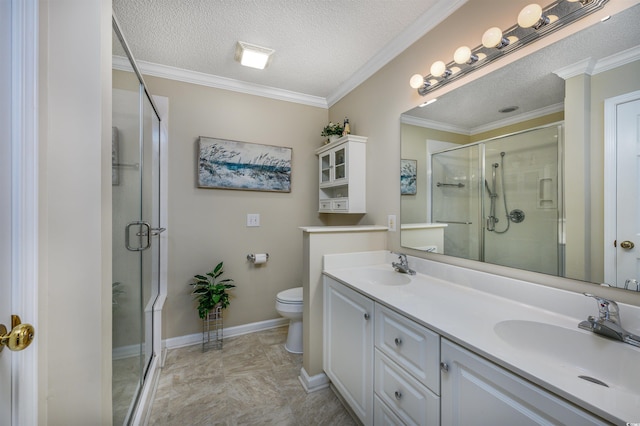 bathroom with vanity, a textured ceiling, an enclosed shower, and toilet