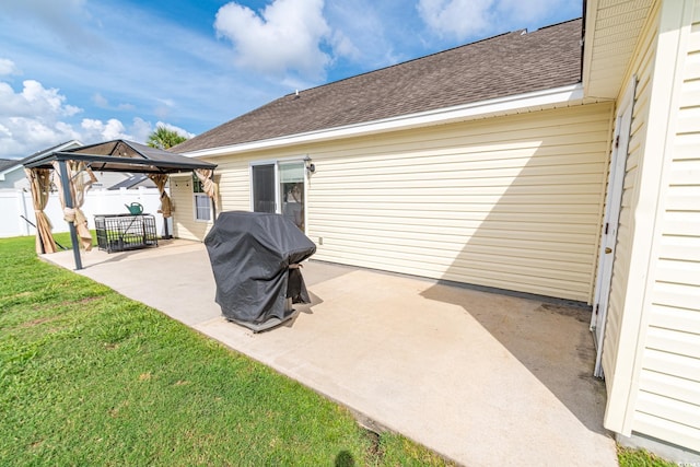 view of patio / terrace featuring a grill and a gazebo