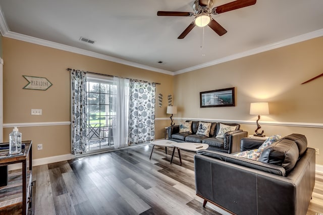 living room with ceiling fan, crown molding, and hardwood / wood-style floors