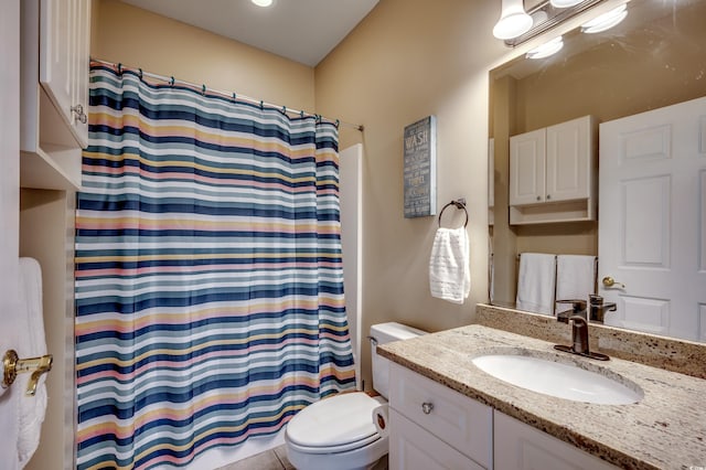 bathroom with walk in shower, tile patterned flooring, vanity, and toilet