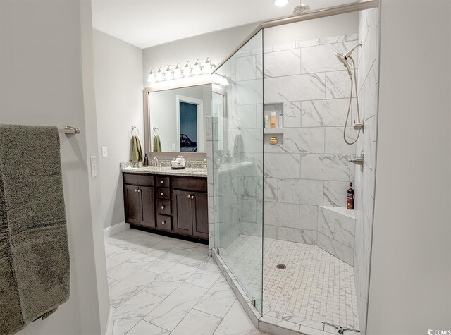 949 Jackline Pl Unit 103, Murrells Inlet, SC 29576 - full bathroom with marble look tiles, double vanity, and a shower stall