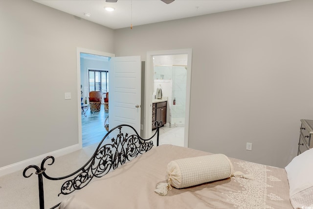 949 Jackline Pl Unit 103, Murrells Inlet, SC 29576 - bedroom featuring connected bathroom, carpet, and ceiling fan