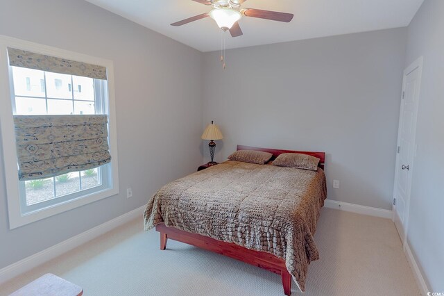 949 Jackline Pl Unit 103, Murrells Inlet, SC 29576 - bedroom with light carpet, baseboards, and ceiling fan