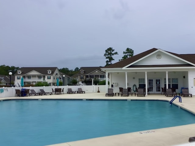 949 Jackline Pl Unit 103, Murrells Inlet, SC 29576 - community pool with french doors, a patio, and a residential view