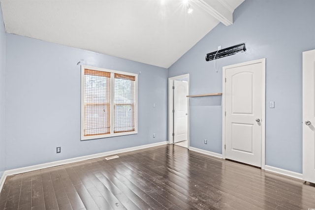 unfurnished bedroom featuring dark hardwood / wood-style floors, beam ceiling, and high vaulted ceiling