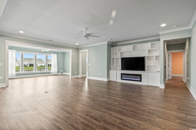 unfurnished living room featuring crown molding, hardwood / wood-style floors, and ceiling fan