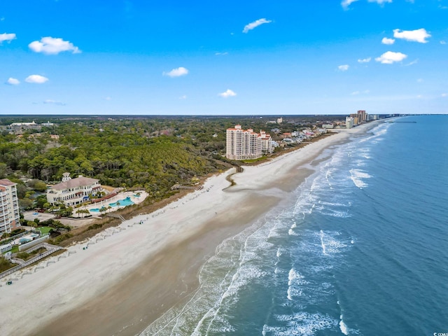 drone / aerial view with a view of the beach and a water view