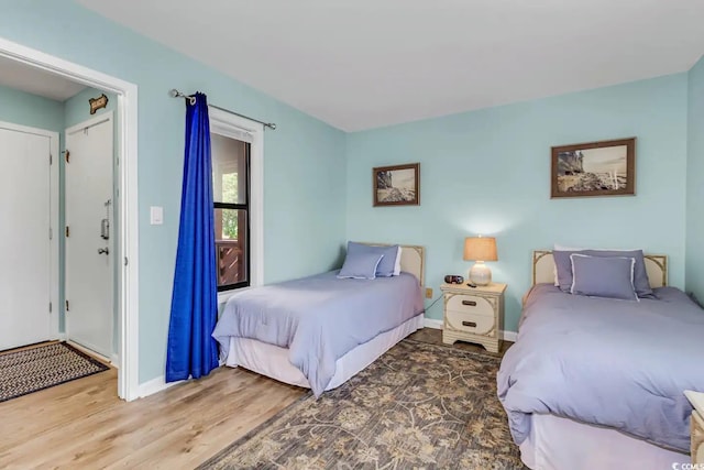 bedroom featuring hardwood / wood-style flooring