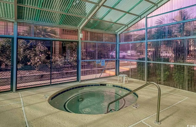 view of pool with an indoor in ground hot tub