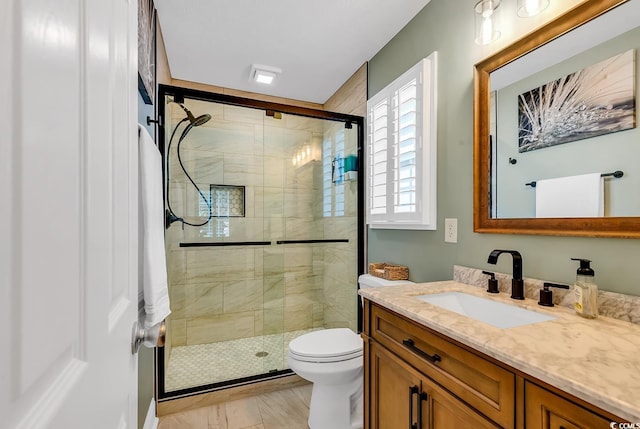 3154 Shorecrest Bay Dr, Murrells Inlet, SC 29576 - bathroom featuring vanity, toilet, and a stall shower