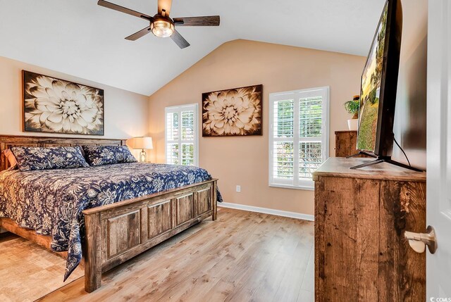 3154 Shorecrest Bay Dr, Murrells Inlet, SC 29576 - bedroom with wood finished floors, ceiling fan, multiple windows, and vaulted ceiling