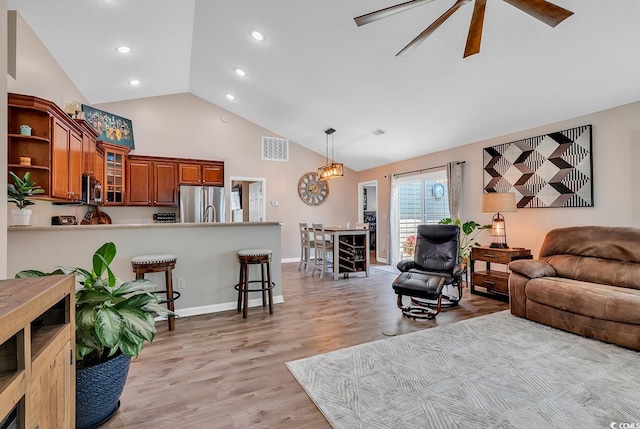 3154 Shorecrest Bay Dr, Murrells Inlet, SC 29576 - living area featuring recessed lighting, high vaulted ceiling, visible vents, light wood-style flooring, and baseboards