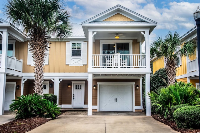 view of front facade featuring a balcony, a garage, and covered porch