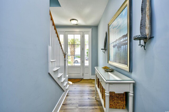 4808 Cantor Ct, North Myrtle Beach, SC 29582 - doorway featuring stairs and wood finished floors