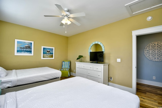 4808 Cantor Ct, North Myrtle Beach, SC 29582 - bedroom with wood finished floors, attic access, baseboards, and ceiling fan