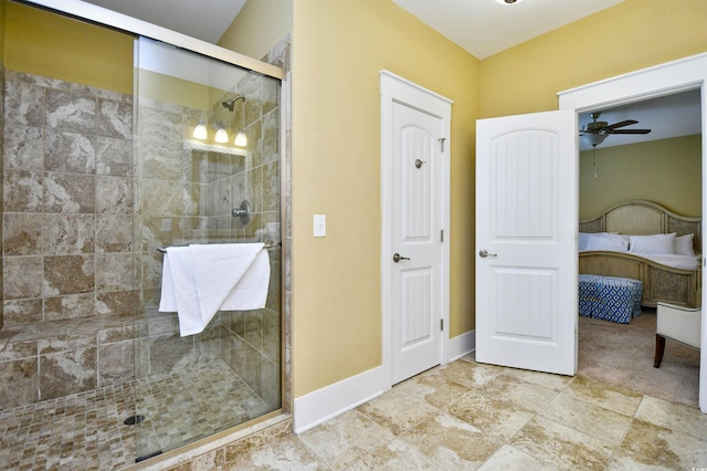 bathroom with ceiling fan and an enclosed shower