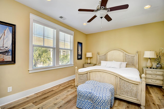 4808 Cantor Ct, North Myrtle Beach, SC 29582 - bedroom with light wood-style flooring, baseboards, recessed lighting, and a ceiling fan