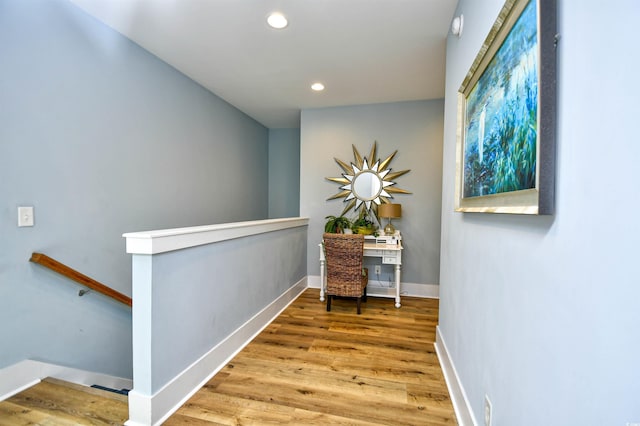 4808 Cantor Ct, North Myrtle Beach, SC 29582 - hall with an upstairs landing, recessed lighting, wood finished floors, and baseboards