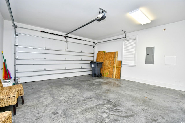 garage featuring a garage door opener and electric panel