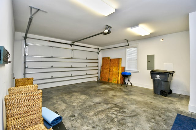 4808 Cantor Ct, North Myrtle Beach, SC 29582 - garage with electric panel, a garage door opener, and baseboards