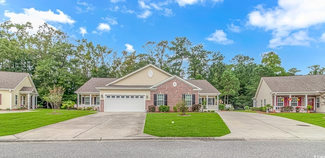 view of front of house with a front yard and a garage