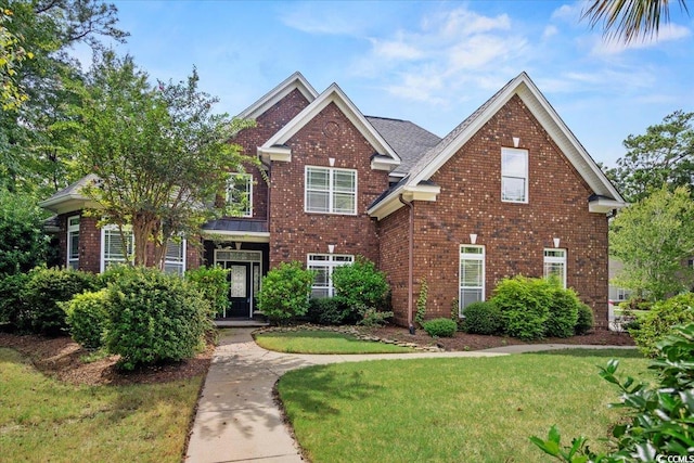 view of front of home with a front yard