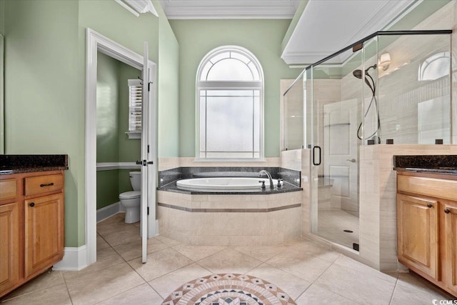 full bathroom with independent shower and bath, tile patterned floors, crown molding, vanity, and toilet