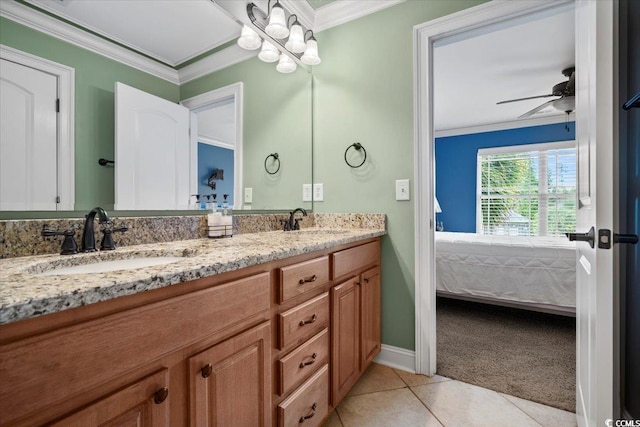 bathroom with ornamental molding, tile patterned floors, ceiling fan, and vanity