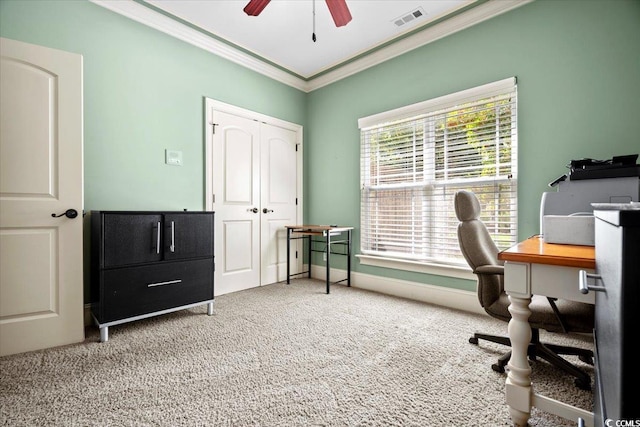 carpeted home office with ornamental molding and ceiling fan