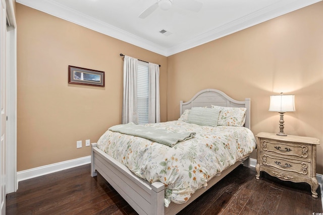 bedroom with ceiling fan, dark hardwood / wood-style floors, and ornamental molding