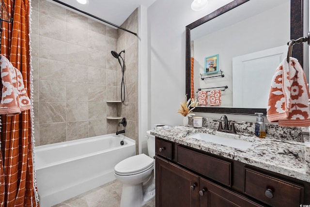 full bathroom featuring tile patterned flooring, vanity, toilet, and shower / bath combo with shower curtain