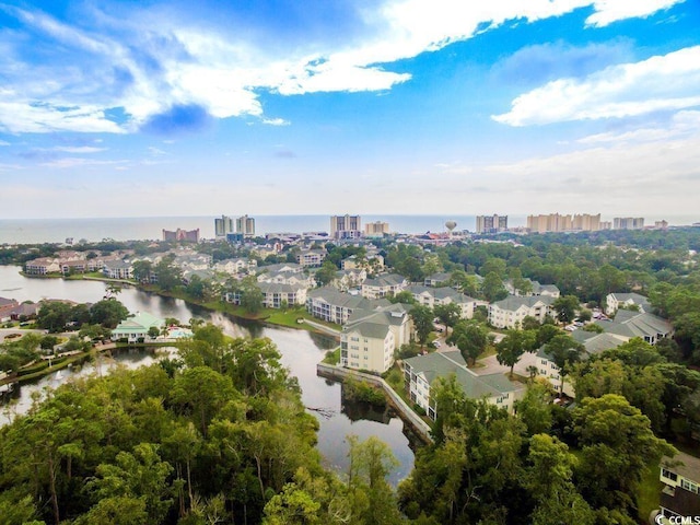 drone / aerial view with a water view