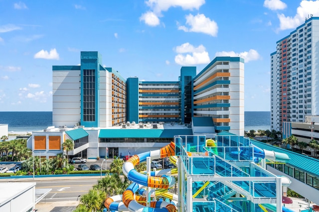 view of building exterior with a water view