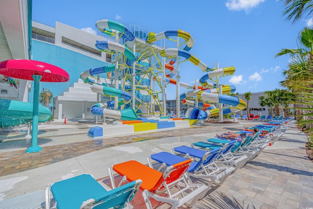 view of swimming pool featuring a patio area