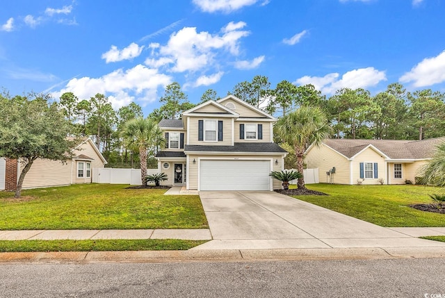 view of property with a garage and a front lawn