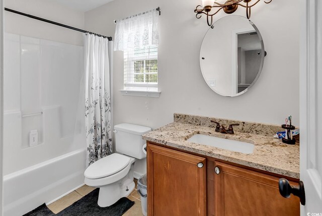 full bathroom featuring tile patterned flooring, a notable chandelier, shower / bathtub combination with curtain, vanity, and toilet