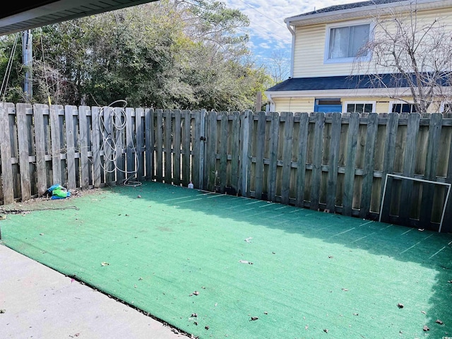 exterior space featuring a fenced backyard