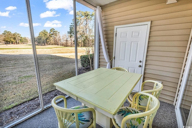 sunroom / solarium featuring plenty of natural light