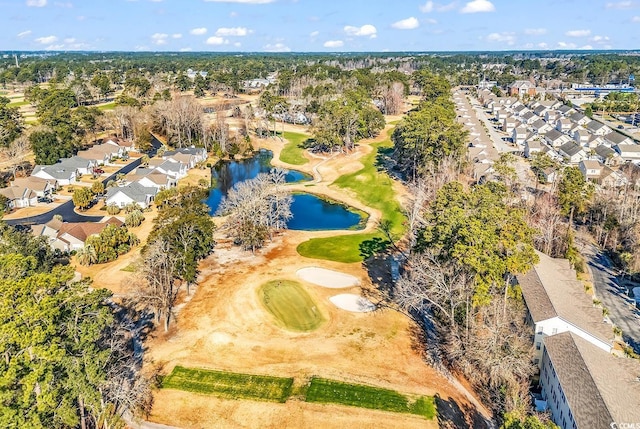 bird's eye view with a water view, a residential view, and golf course view