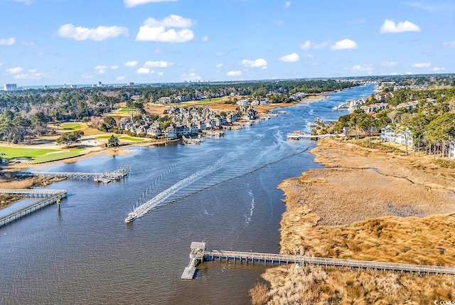 drone / aerial view with a water view