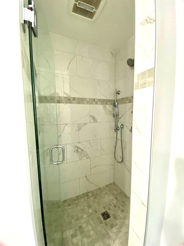 bathroom with walk in shower