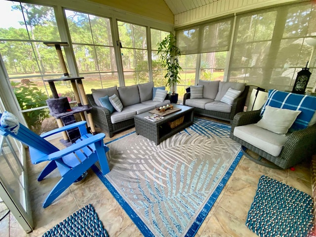 sunroom with vaulted ceiling